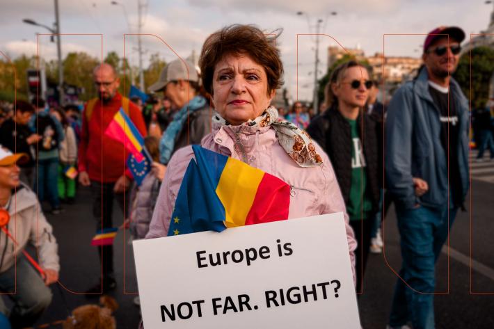 Woman at protest in Romania holds up sign that reads: Europe is NOT FAR. RIGHT?