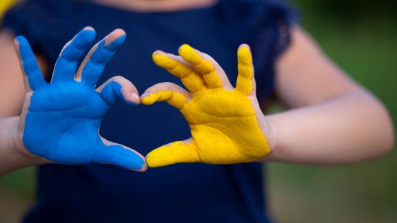 Ukranian flag in hands